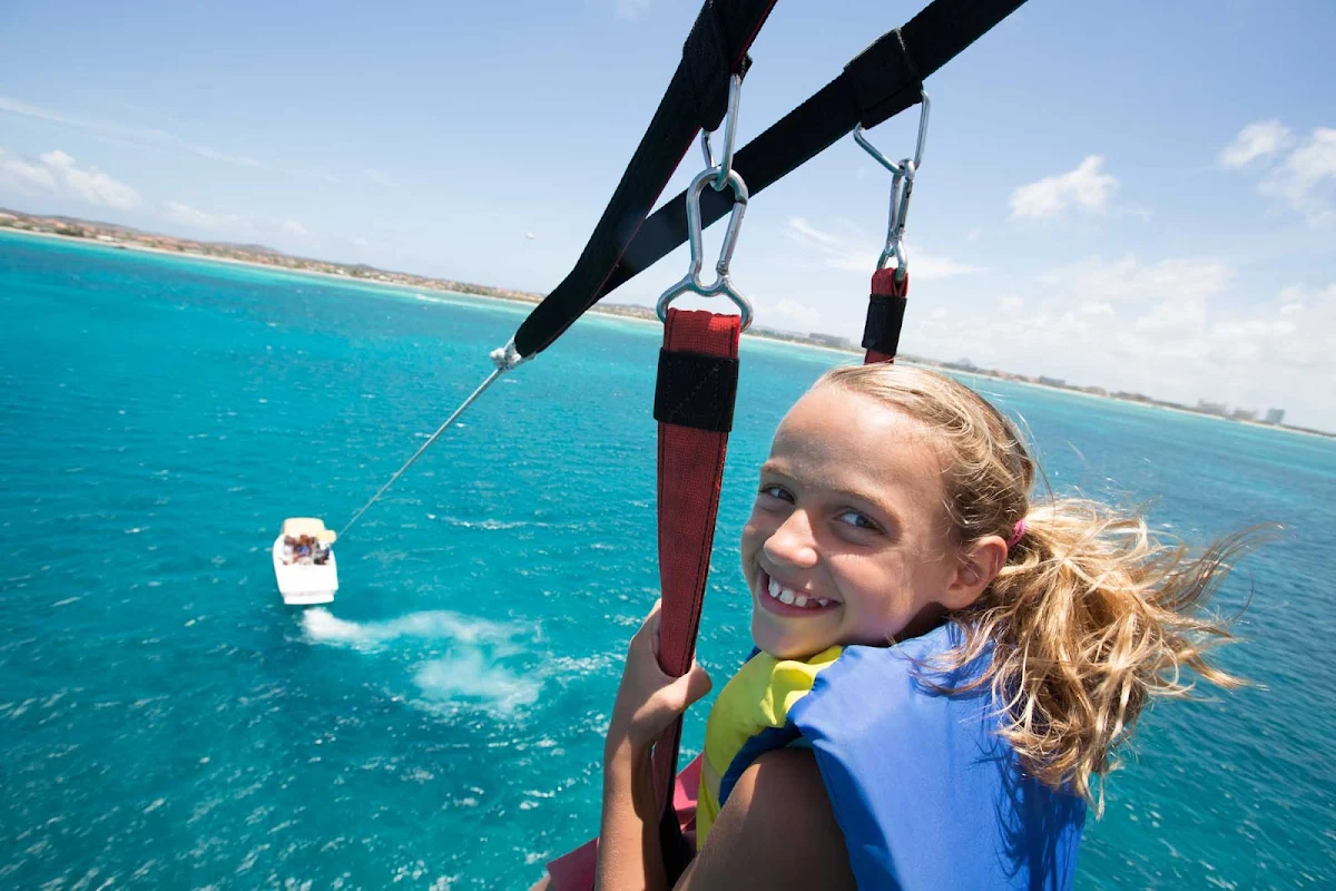 parasail-lift-Aruba - Get a bird's-eye view of Arub's beaches while parasailing.