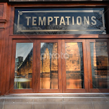 Bridge Reflection in Door G;ass by Dan Dusek -  