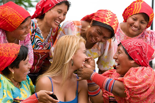 Panama-women - Local women joke with a visitor in Panama.