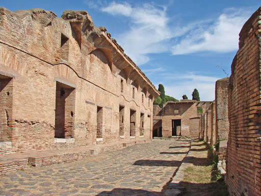 Ostia Antica, a large archeological site, was once the main harbor of ancient Rome. Today it's near the modern suburb of Ostia, and you can wander through ruins of Roman streets and many buildings.
