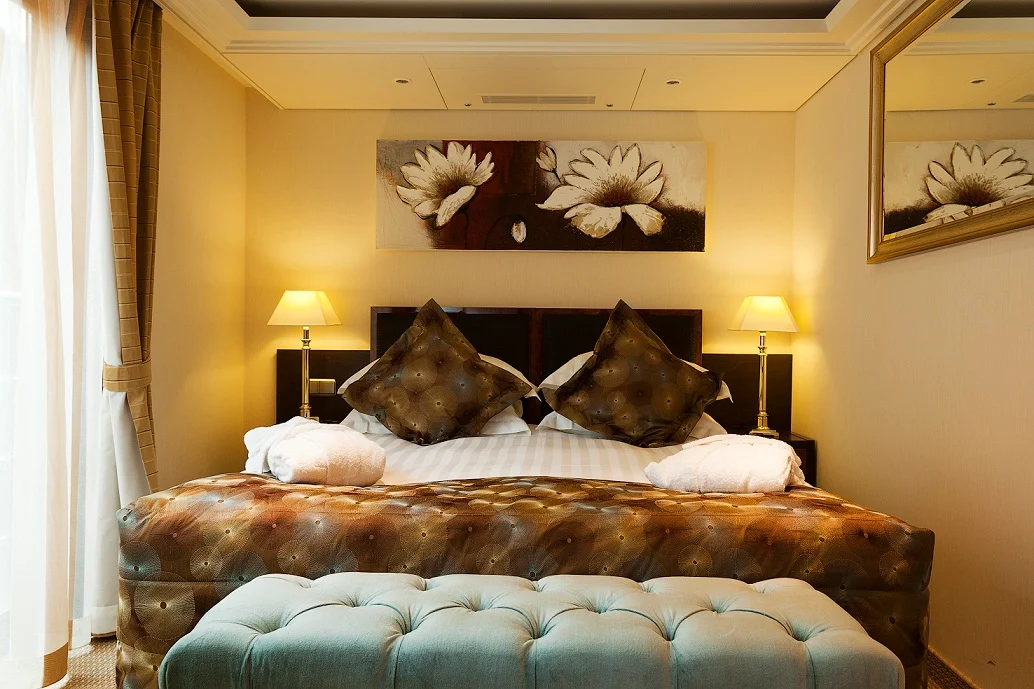 AmaVerde-Stateroom-Standard - A standard stateroom aboard AmaVerde. The 161-passenger ship offers staterooms ranging from 170 square feet for a solo cruiser to luxury suites running 350 square feet with two balconies.