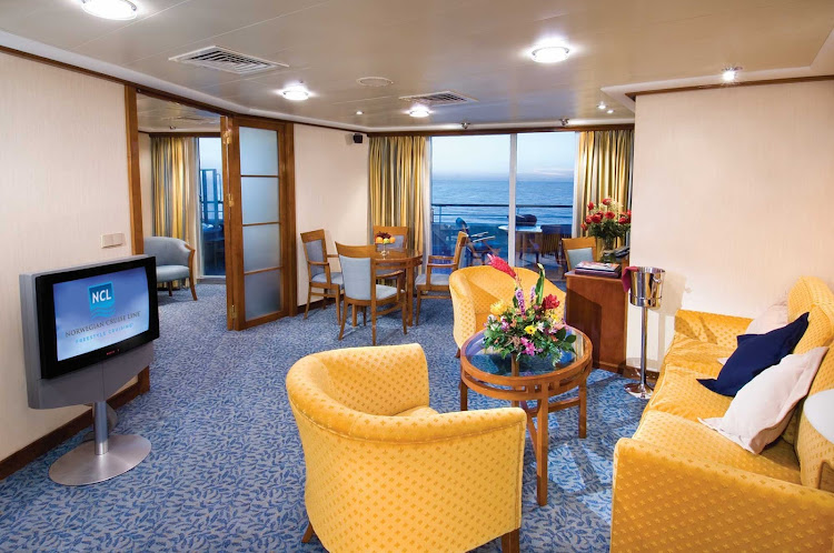 The Owner's Suites aboard Norwegian Sky feature private balconies and separate living and dining areas.