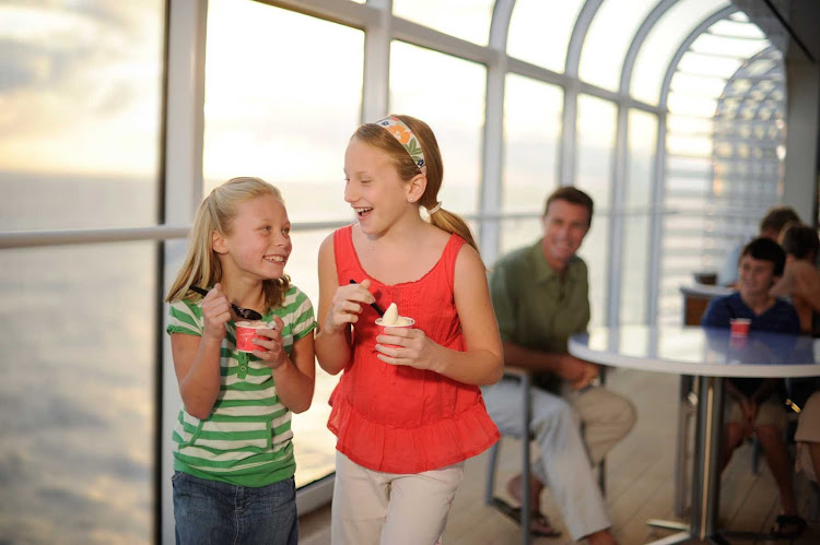 Disney Dream offers passengers fun snacks and dishes in a spacious dining area with nice views.