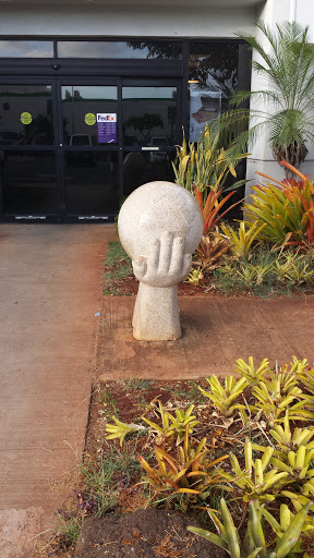 FedEx Hands Holding Globe Statue