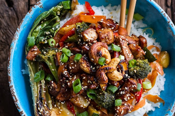 Quick Honey Ginger Pineapple and Summer Veggie Chicken Stir Fry with Caramelized Cashews.
