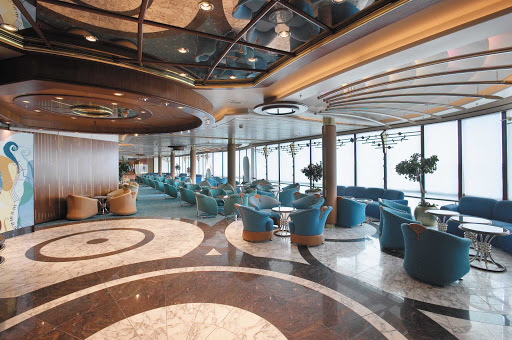Kick back and mingle at the Fascinating Rhythm lounge aboard Enchantment of the Seas.