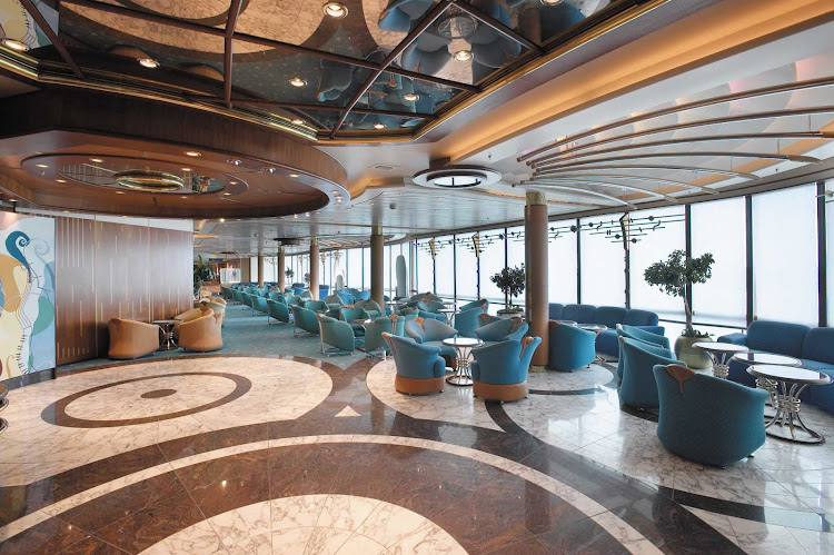 Kick back and mingle at the Fascinating Rhythm lounge aboard Enchantment of the Seas.