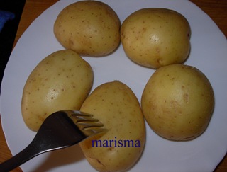 filetes de ternera empanados con patata asada, patatas