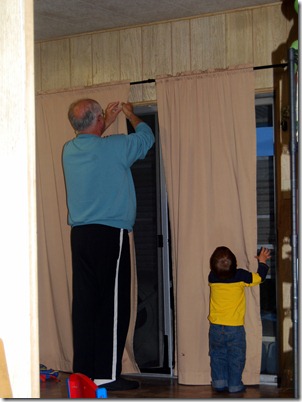 putting up curtains