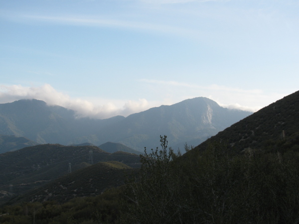 Clouds coming in low over the mountains.