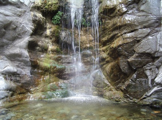 shower at the bottom of the falls