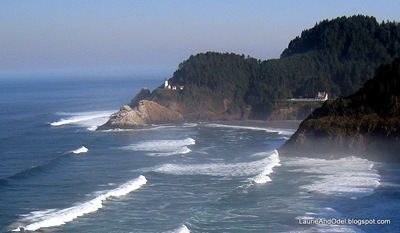 Heceta Head Lighthouse on the point; the Keepers house on the right.