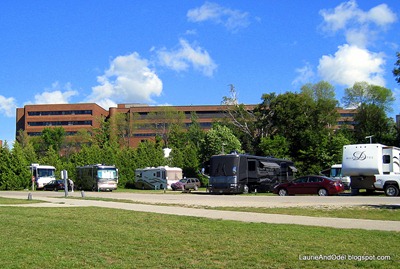 RV's with the hospital on the bluff above the park.