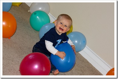 ry laughing with balloons (1 of 1)
