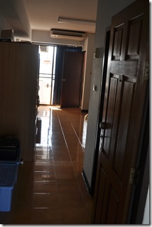 Rachaprarop Tower Apartment-3 down hallway past bathroom to bedroom