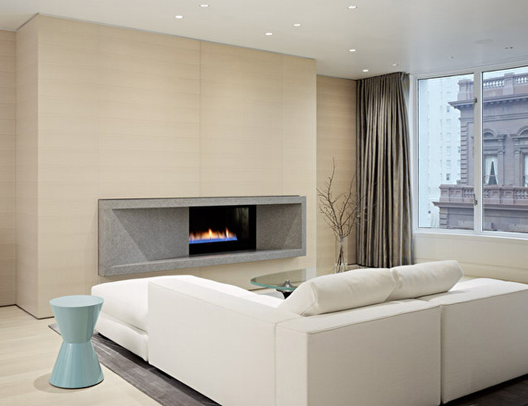 trendy minimalist living room with fireplace