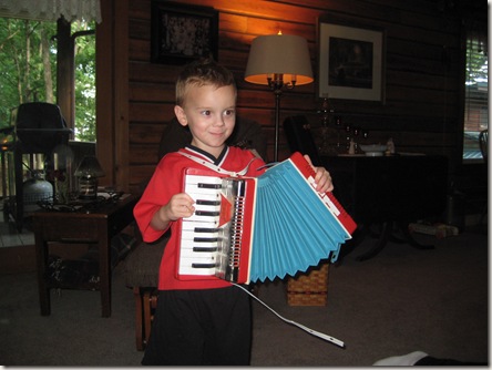 Austin playing the accordion