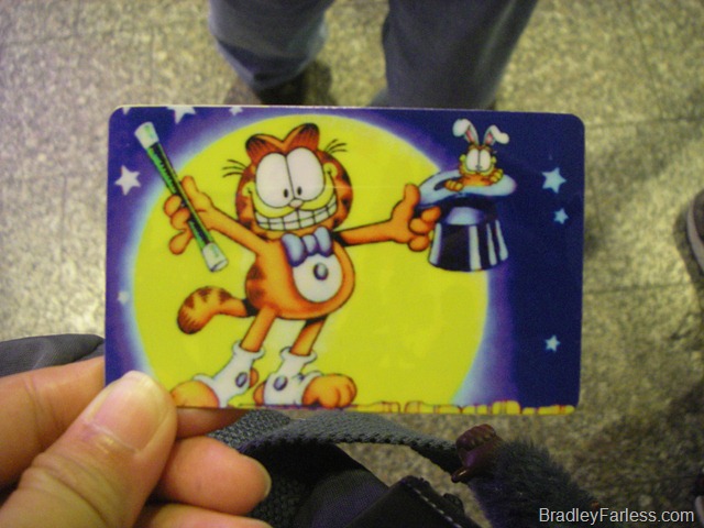 Singapore ez-link card with a Garfield sticker on it. Singapore ez-link card with a Garfield sticker on it.