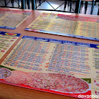 Tables are adorned with menu placemats at Mamma Maria's Pizzeria