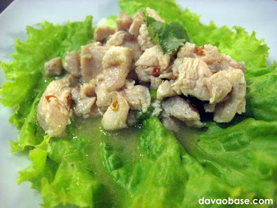 Laarb Gai (minced chicken salad with cilantro on a bed of lettuce)