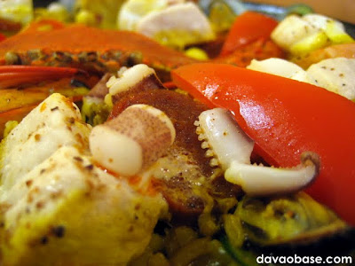 Tiny Kitchen's Paella Valencia is loaded with seafood favorites: crab, shrimp, fish and squid