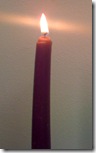 Purple Advent Candle Burning