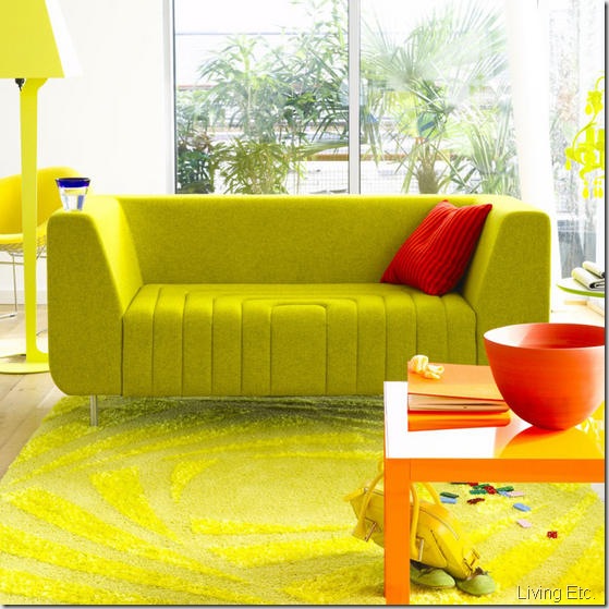 White bright bold living room green designer sofa rug orange coffee table  L etc 06/2007 pub orig 
