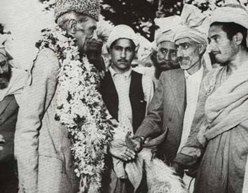 As a gesture of goodwill, tribal leaders presenting a goat to the Quaid