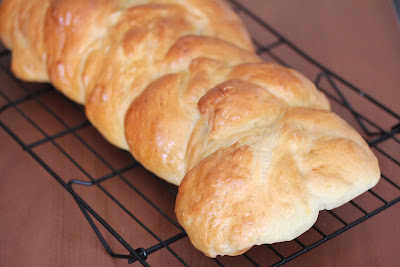 photo of a whole loaf of braided milk bread