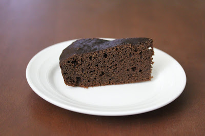 photo of a slice of steamed chocolate cake