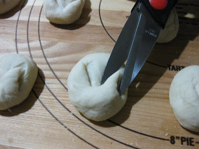photo showing how to shape the ears in the dough ball