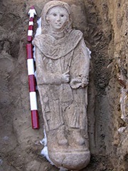  The three feet tall intricately carved plaster sarcophagus portraying a wide-eyed woman dressed in a tunic [Photo: AP]  