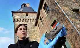 300-year-old shoes found in castle wall during restoration