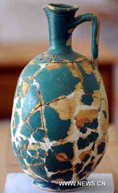 A green-glazed vase bottle imported from Persia in ancient China's Eastern Han Dynasty (25-220) at Caoxie Village in Lianzhou Town of Hepu County, southwest China's Guangxi Zhuang Autonomous Region.