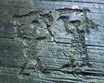 Two warriors fighting on Naquane rock n. 35 (Iron Age) 