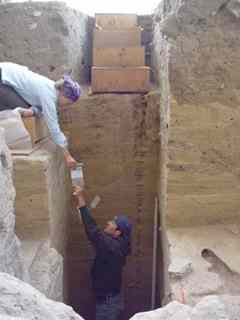 Bradley Newbold hands a bag up to Sara Hill. Newbold finished a master's degree at BYU and is now seeking a Ph.D. at Washington State University. Hill is a grad student at UNLV.
