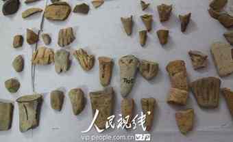 Stone objects are unearthed at the Pingdingnao Ruins.