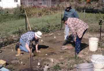Archaeologists excavating the Native American site situated in a former potato field next to a swamp in northwestern Pennsylvania, southern Crawford County.