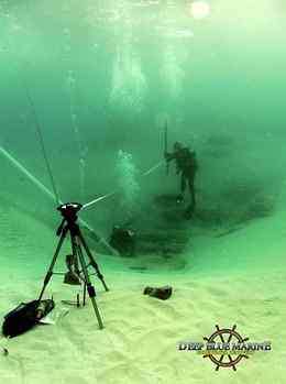 The photo is of Deep Blue Marine's divers working on the site taking measurements and marking the locations of important aspects of the site. (Image: Photo by Aaron Selmi)