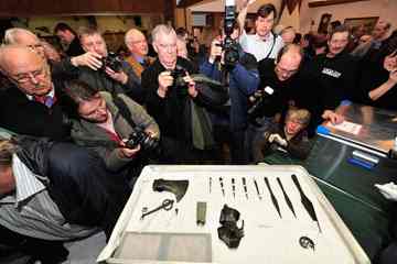 The weapons found include battle axes and arrow heads.