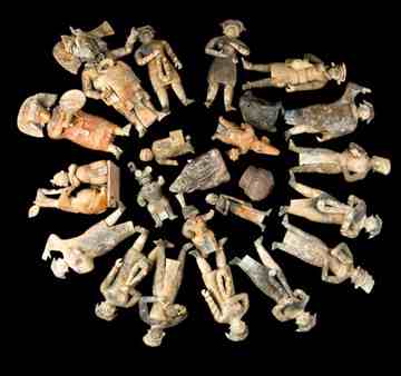 The restored figurines are shown in roughly the positions in which they were found. (Ricky López) 