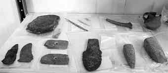 More than 100 stone wares and pottery vessels were excavated in this settlement site in Luoyang city in northwest China. (Photo by Zhang Xiaoli/dahe.cn)