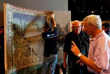 Personnel from Oprintendenza Speciale per i beni Archeologici di Napoli e Pompei and the National Museum of Singapore erect a mosaic water fountain recovered from Pompeii as they prepare for an exhibition, entitled Pompeii Life in a Roman Town 79CE, in Singapore. The first exhibition of its kind in South East Asia will focus on what life was like in ancient Pompeii before its destruction by the eruption of Mount Vesuvius. The exibition runs at the National Museum of Singapore from 16 Oct. 2010 to 25 Jan. 2011. 