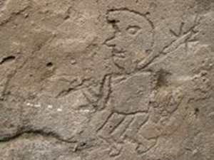 The relatively informal style of a warrior engraving adds to the oddness of Huaca Colorada. Photograph courtesy Edward Swenson.