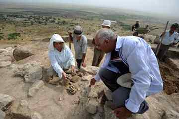 Archeologist Hamlet Petrosyan and his team working at site.