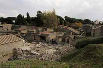 Italy is rich in ancient wonders, but the real wonder might be that so many of them are still standing, given the poor care often accorded them. The collapse last week in Pompeii into a heap of crumbled stone and swirling dust of the frescoed building where gladiators prepped for combat - a piece of storied past which survived the furious explosion of Vesuvius in 79 A.D. - was the latest archeological accident waiting to happen in this country. (AP Photo/Franco Castano')