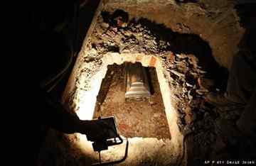 A tin box with remains of the famous Danish astronomer Tycho Brahe is displayed after taken out of its tomb at the Church of Our Lady in front of Tyn, at the Old Town Square in Prague, Czech Republic, Monday, Nov. 15, 2010. 