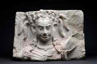 The Apsara head represents the Angkor Kingdom.