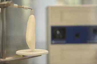 A reproduction of an archeological find sits in a Next Engine optical scanner at the UC Merced archeology exhibit. The scanner is great for scanning small artifacts with extremely high levels of resolution, according to an exhibit sign. [PHOTO BY BEA AHBECK]