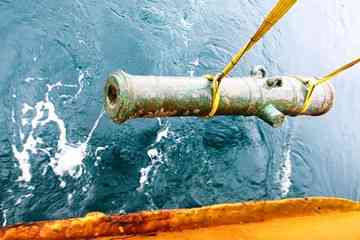Odyssey prides itself on finding shipwrecks. Above, the company pulled a canon in 2008 from HMS Victory's watery grave in the English Channel.